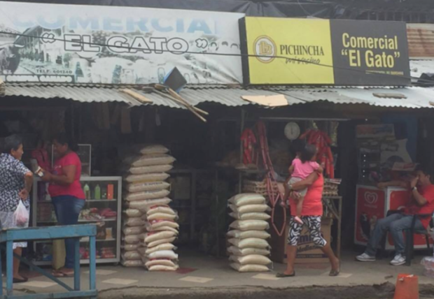Notice the name on the commercial tienda. &quot;El Gato.&quot; Everyone has a nickname here, and this is the store owner's moniker. Every fourth man here is nicknamed El Gato. Why would any guy want to be called The Cat?